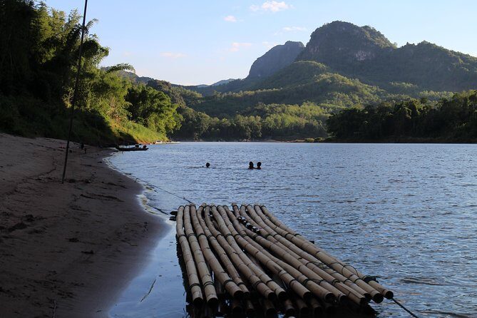 FULL DAY – Kuang Si Waterfall, Kayak on the Nam Ou / Mekong River, Pak Ou Caves - Kuang Si Falls: Three Tiers, Turquoise Pools, and the Bear Rescue Center