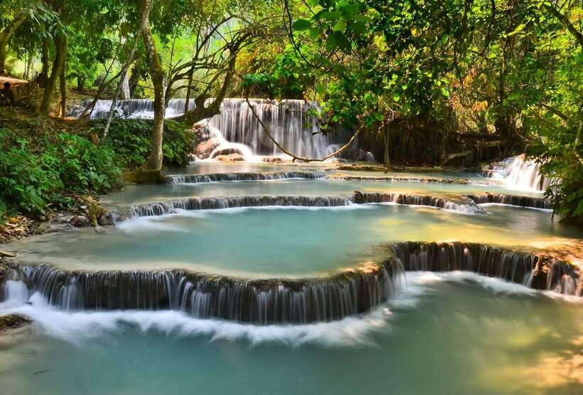 Luang Prabang: Bamboo Experience & Kuang Si Falls Tour - After lunch at the pavilion: bamboo games and performance moments
