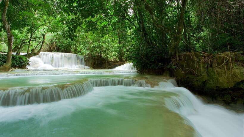 Luang Prabang: Kuang Si Bike Ride & Long-Tail Boat Cruise - The 30 km paved-road bike ride: rural villages and a real workout