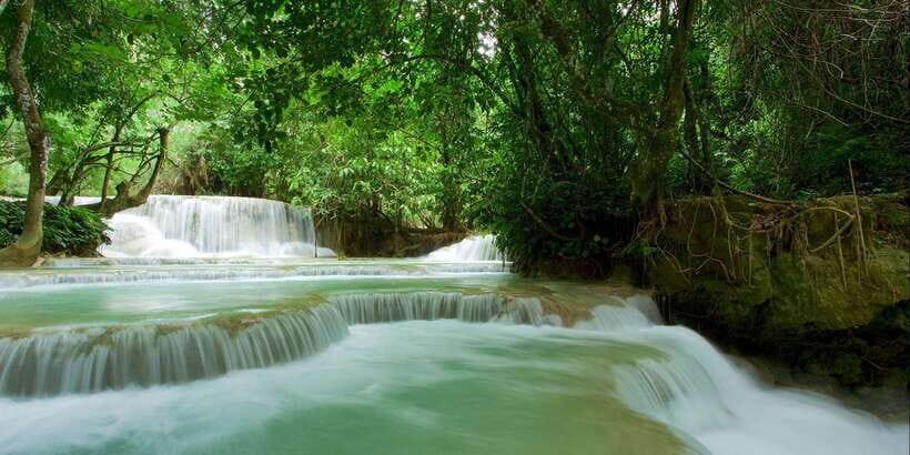 Luang Prabang: Kuang Si Bike Ride & Long-Tail Boat Cruise - Long-tail boat on the Mekong: the cool-down you’ll feel