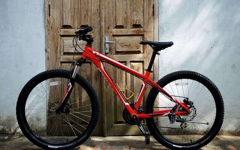 Luang Prabang: Kuang Si Bike Ride & Long-Tail Boat Cruise - Morning pickup and the bike shop start (what sets the tone)