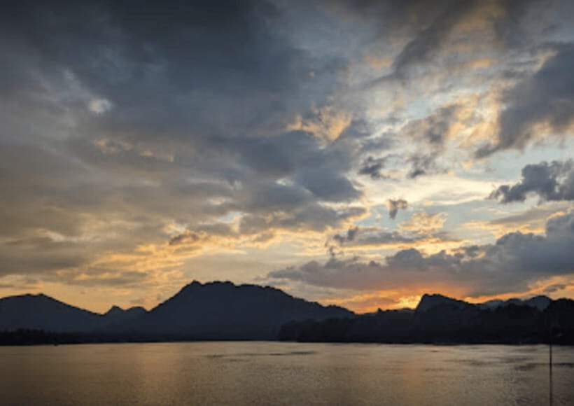 Luang Prabang: Mekong Sunset Cruise & Lao Tasting Dinner - The bamboo-leaf wish ritual and symbolic fish release