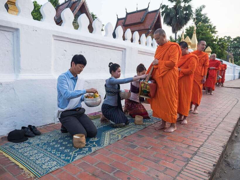Luang Prabang: UNESCO World Heritage City Highlights Tour - Alms-giving at Dawn and the Morning Market That Makes Luang Prabang Click