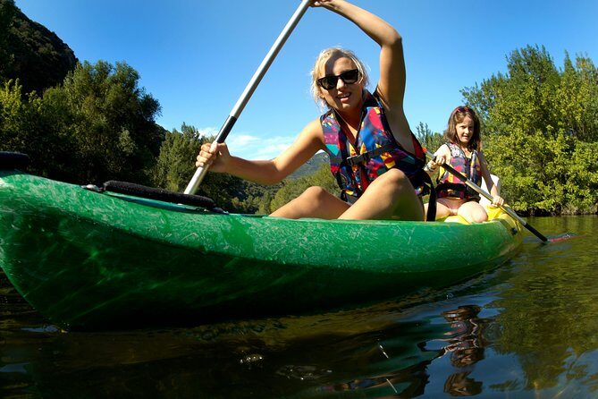 One Day Guided Tour: Kayaking, Zipline & Tubing In The Cave from Vang Vieng - Nam Song River kayaking: 7 km, 3 stations, and karst views