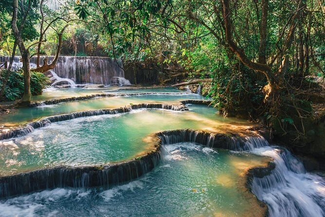 Pak Ou Caves and Kuang Si Fall Day Tour - The Mekong Boat Ride That Makes the Day Feel Like a Day