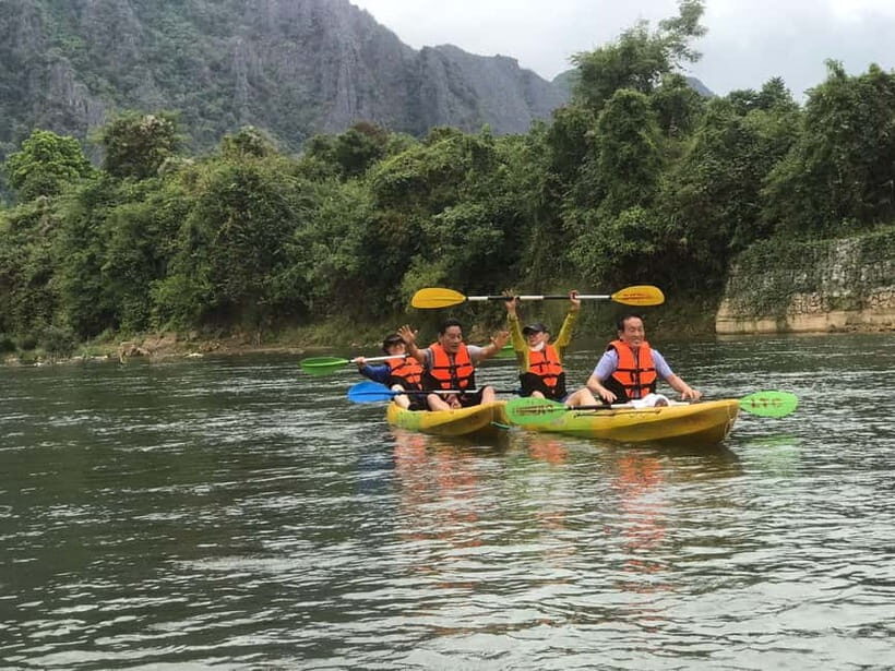 Vang Vieng: Day Tour with Kayaking, Ziplining, and Rafting - Nam Song Kayaking: Rapids, Riverbank Views, and a Safety Brief