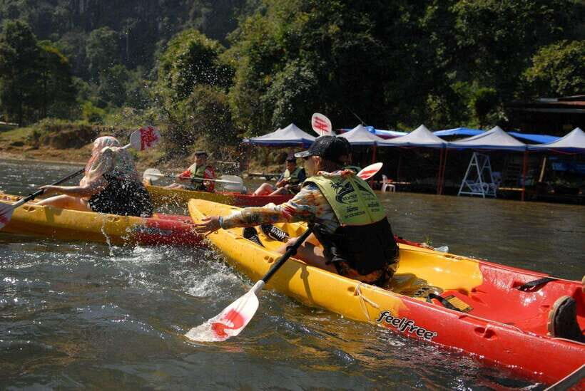 Vang Vieng: Day Tour with Kayaking, Ziplining, and Rafting - Ziplining: Flying Over Forest and Water