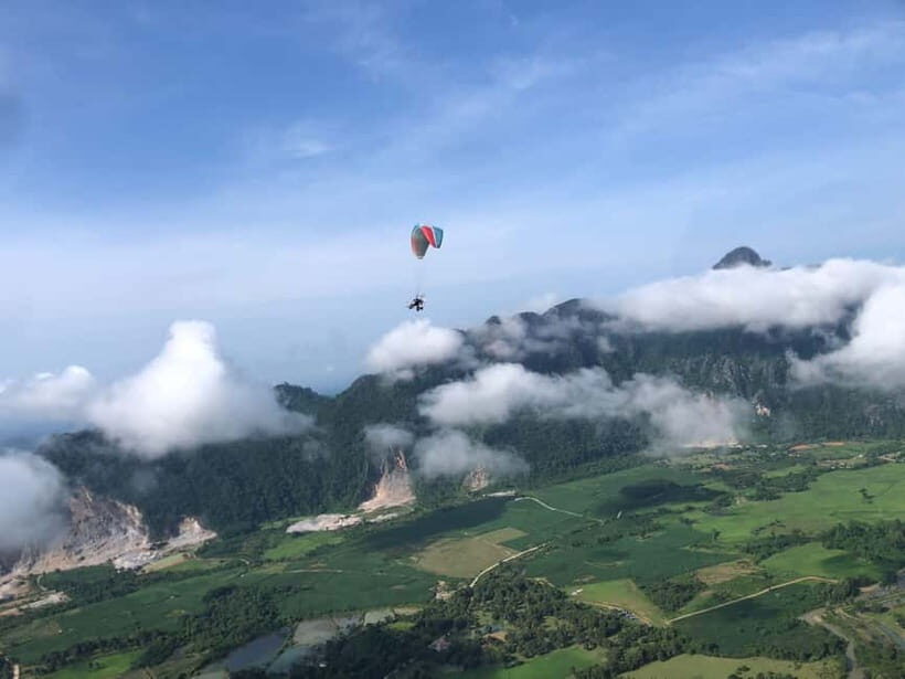 Vang Vieng: Paragliding Experience with Hotel Pickup - Vang Vieng from above: what makes this 15-minute paragliding special