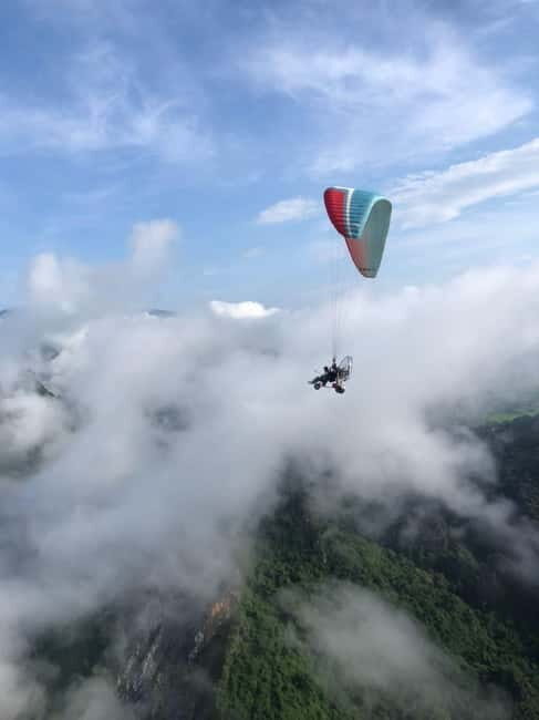 Vang Vieng: Paragliding Experience with Hotel Pickup - Pickup in Vang Vieng city: keeping the day easy